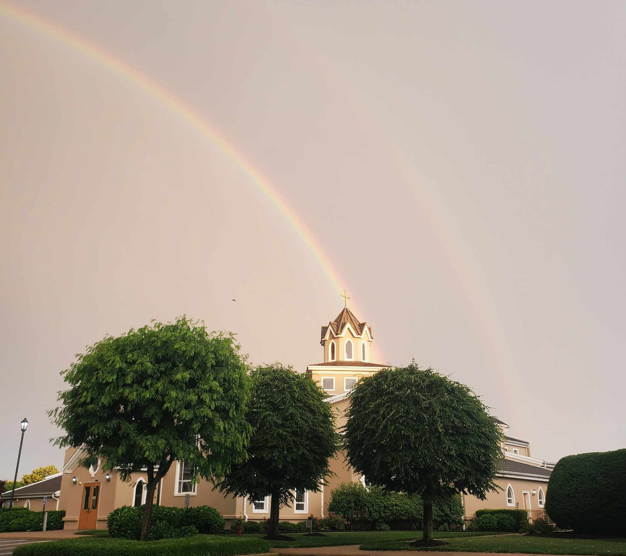 Rainbow over church 2026